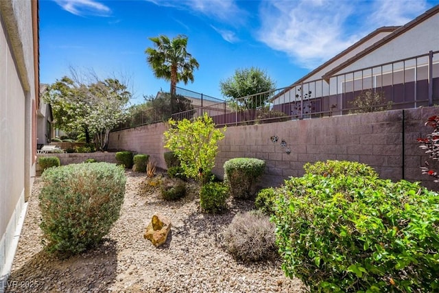 view of yard with fence