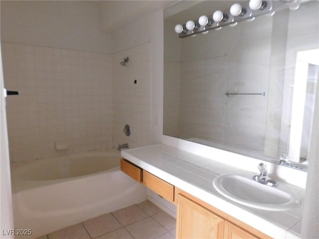 bathroom with tile patterned floors,  shower combination, and vanity