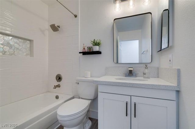 718 Nectarine Ct, Henderson, NV 89014 - bathroom featuring toilet, vanity, and bathing tub / shower combination