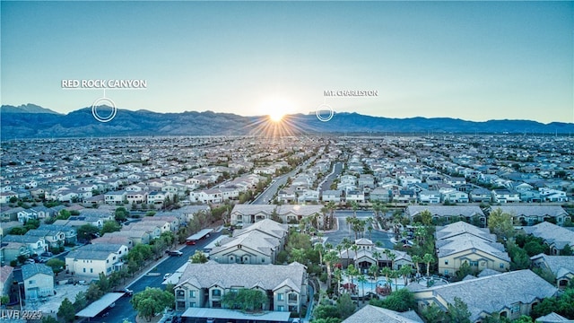 aerial perspective of suburban area with a mountain backdrop