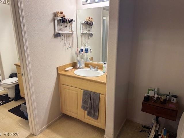 8250 N Grand Canyon Dr Unit 2154, Las Vegas, NV 89166 - bathroom featuring toilet and vanity