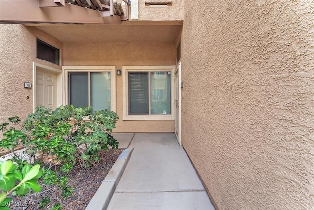 8985 S Durango Dr Unit 1110, Las Vegas, NV 89113 - view of exterior entry featuring stucco siding