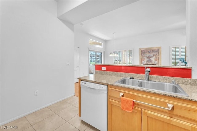 8985 S Durango Dr Unit 1110, Las Vegas, NV 89113 - kitchen with white dishwasher, a sink, light tile patterned flooring, and light countertops