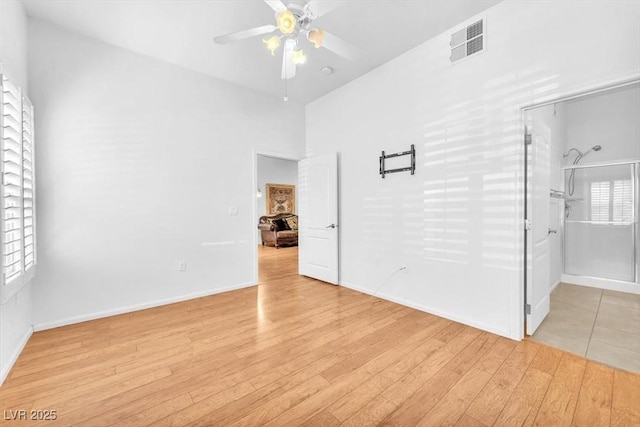 8985 S Durango Dr Unit 1110, Las Vegas, NV 89113 - unfurnished bedroom featuring light wood finished floors, baseboards, and ceiling fan