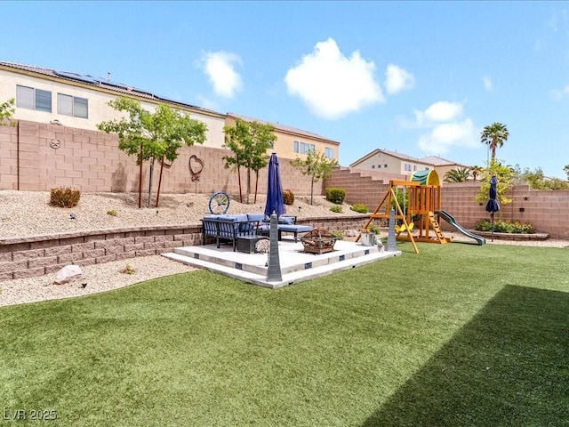 view of playground with a patio area and an outdoor hangout area