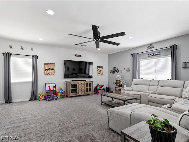 living area with ceiling fan, carpet flooring, and recessed lighting