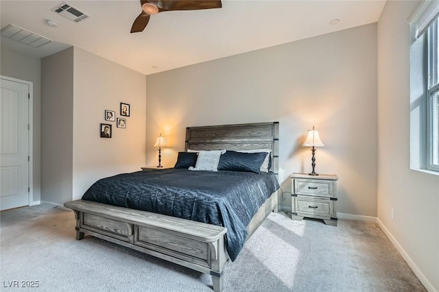 bedroom with carpet flooring, baseboards, and a ceiling fan