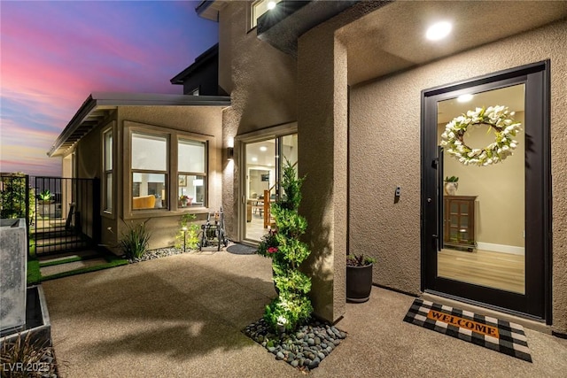 436 Crown Mesa Ave, Las Vegas, NV 89138 - exterior entry at dusk featuring stucco siding
