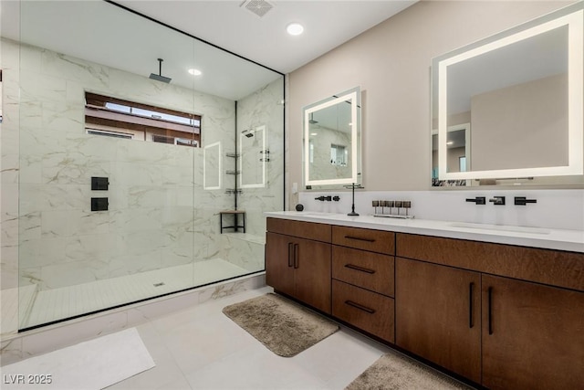 436 Crown Mesa Ave, Las Vegas, NV 89138 - bathroom with a marble finish shower, double vanity, and recessed lighting
