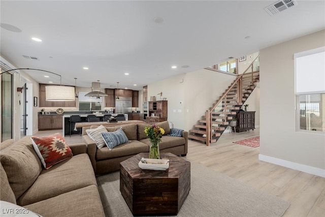 436 Crown Mesa Ave, Las Vegas, NV 89138 - living area featuring light wood finished floors, stairway, recessed lighting, and baseboards