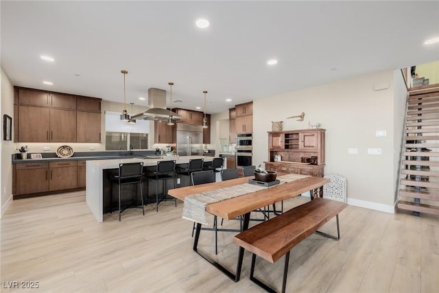 436 Crown Mesa Ave, Las Vegas, NV 89138 - dining room with light wood-type flooring, recessed lighting, and baseboards