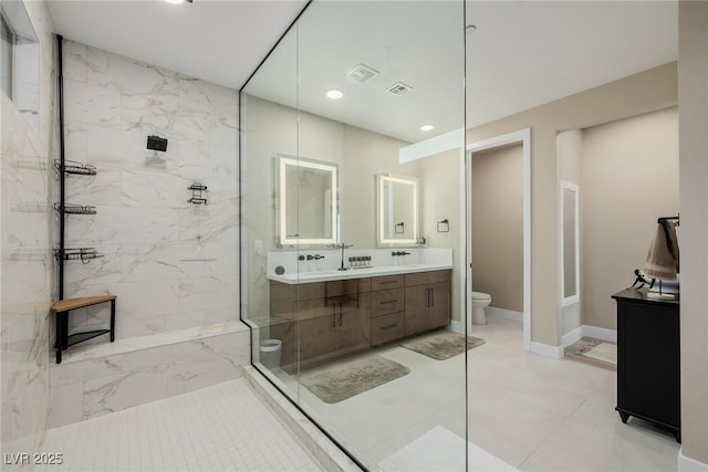 436 Crown Mesa Ave, Las Vegas, NV 89138 - bathroom with toilet, a marble finish shower, double vanity, recessed lighting, and marble finish flooring
