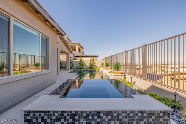 436 Crown Mesa Ave, Las Vegas, NV 89138 - fenced backyard with a patio area