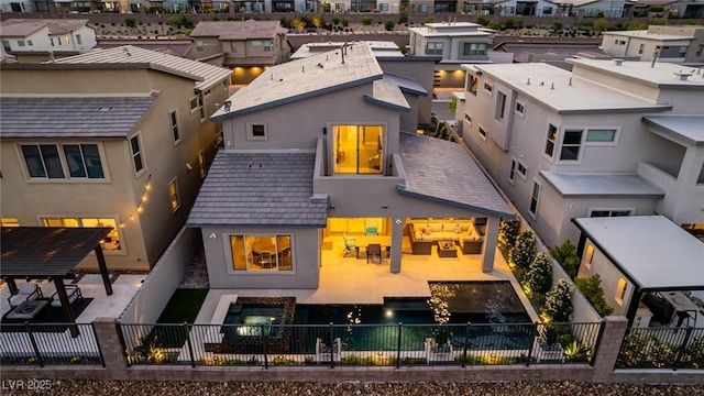 436 Crown Mesa Ave, Las Vegas, NV 89138 - rear view of house with stucco siding, a residential view, a fenced backyard, and a high end roof