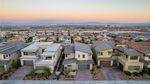 436 Crown Mesa Ave, Las Vegas, NV 89138 - aerial view at dusk of a residential view and a mountain view
