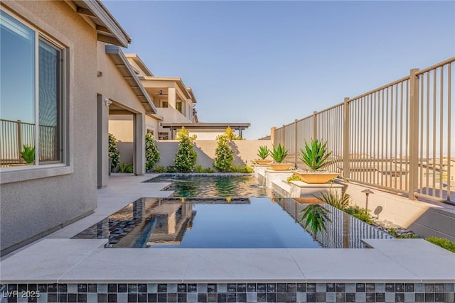 436 Crown Mesa Ave, Las Vegas, NV 89138 - fenced backyard with a patio area