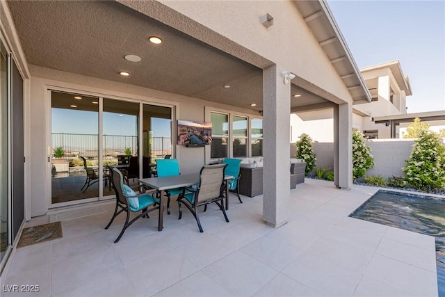 436 Crown Mesa Ave, Las Vegas, NV 89138 - view of patio / terrace with fence and outdoor dining space