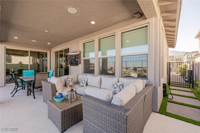 436 Crown Mesa Ave, Las Vegas, NV 89138 - view of patio / terrace with an outdoor hangout area and fence