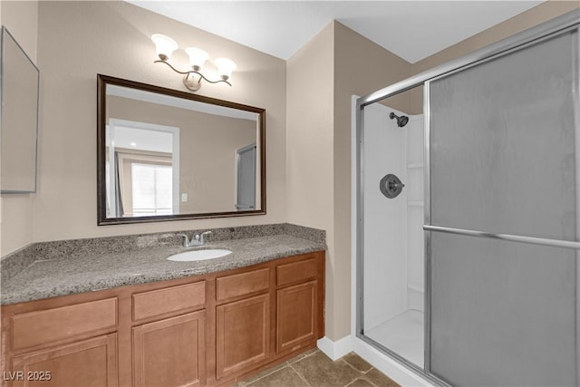 7200 Pirates Cove Rd Unit 1011, Las Vegas, NV 89145 - full bathroom with a stall shower, tile patterned flooring, and vanity