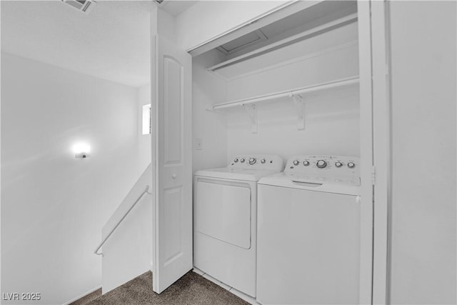 5029 Spencer St Unit D, Las Vegas, NV 89119 - washroom featuring separate washer and dryer and dark carpet