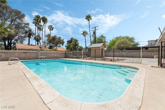 view of swimming pool featuring a fenced backyard
