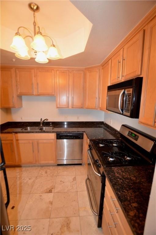 270 E Flamingo Rd Unit 136, Las Vegas, NV 89169 - kitchen with stainless steel appliances, a sink, a chandelier, and light brown cabinetry