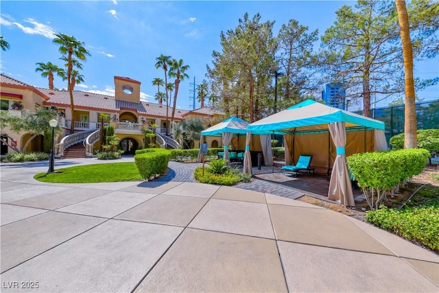 270 E Flamingo Rd Unit 136, Las Vegas, NV 89169 - view of community featuring stairway and a patio