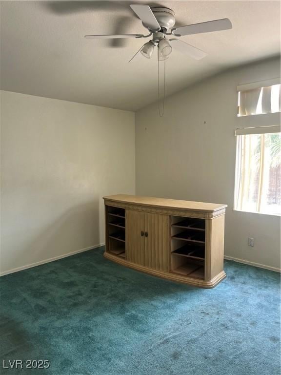 128 Appian Way, Henderson, NV 89002 - empty room featuring ceiling fan, carpet, baseboards, and vaulted ceiling
