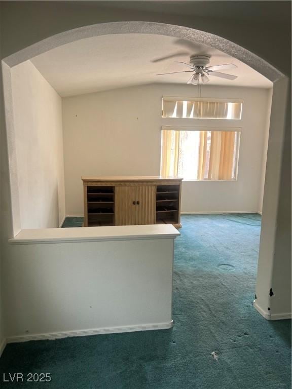 128 Appian Way, Henderson, NV 89002 - carpeted spare room with arched walkways, ceiling fan, and baseboards