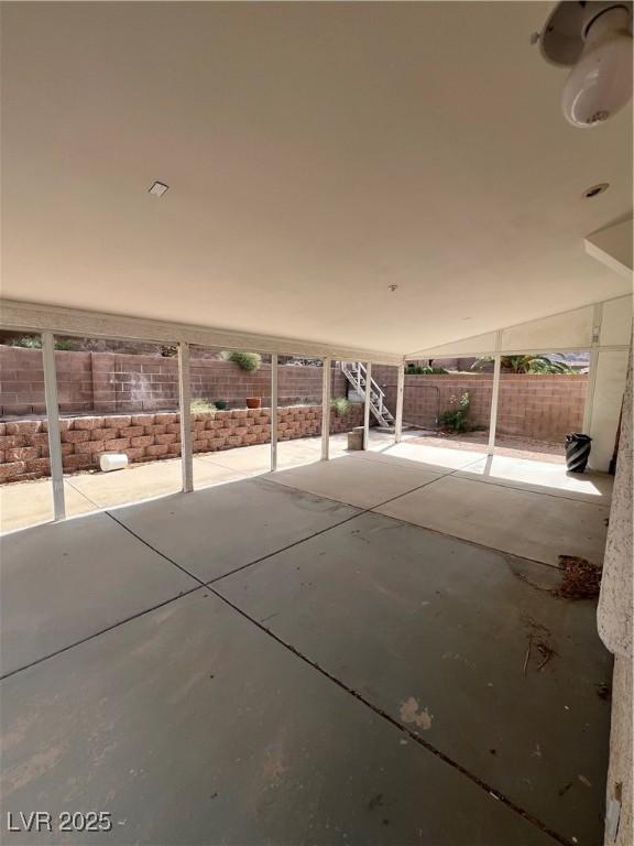 128 Appian Way, Henderson, NV 89002 - view of patio with a fenced backyard and stairway