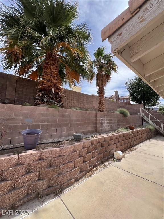 128 Appian Way, Henderson, NV 89002 - view of home's exterior featuring a fenced backyard and a patio