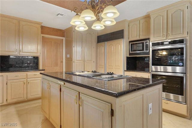 1931 Pago Ct, Las Vegas, NV 89117 - kitchen with built in appliances, light tile patterned floors, light brown cabinets, and a center island