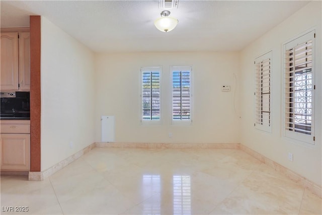 1931 Pago Ct, Las Vegas, NV 89117 - unfurnished room with baseboards and light tile patterned flooring