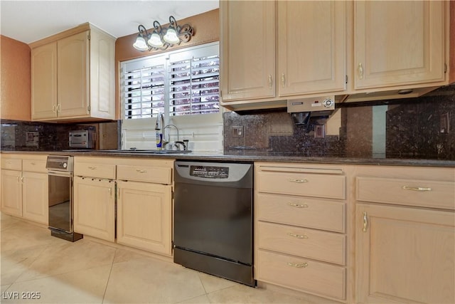 1931 Pago Ct, Las Vegas, NV 89117 - kitchen with dishwasher, light tile patterned flooring, decorative backsplash, dark countertops, and light brown cabinets