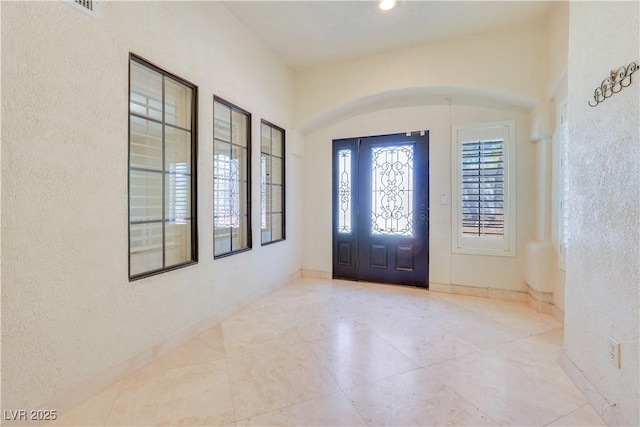 1931 Pago Ct, Las Vegas, NV 89117 - foyer with tile patterned floors and a textured wall