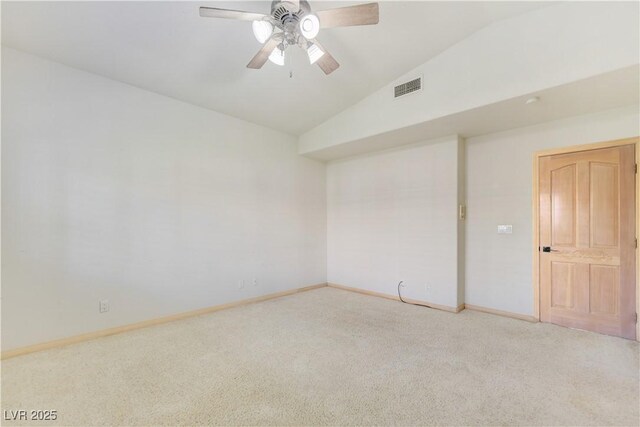 1931 Pago Ct, Las Vegas, NV 89117 - empty room with vaulted ceiling, light colored carpet, baseboards, and a ceiling fan