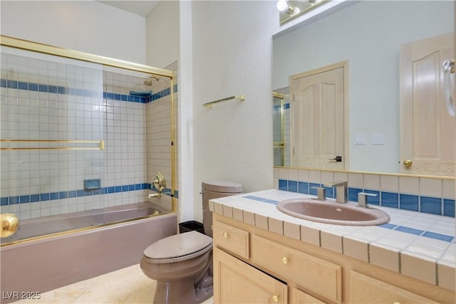 1931 Pago Ct, Las Vegas, NV 89117 - bathroom featuring vanity and bath / shower combo with glass door