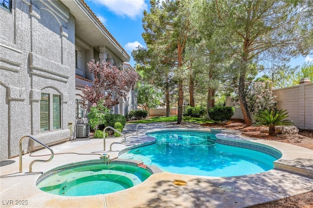 1931 Pago Ct, Las Vegas, NV 89117 - view of pool with a patio area, a fenced backyard, and a pool with connected hot tub