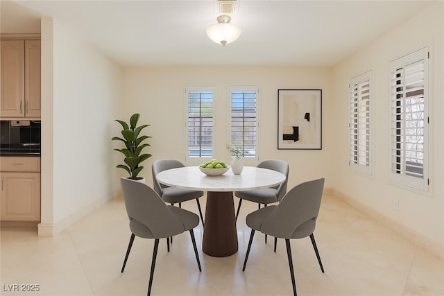 1931 Pago Ct, Las Vegas, NV 89117 - dining space with baseboards and light tile patterned flooring
