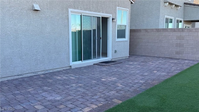 view of patio with fence