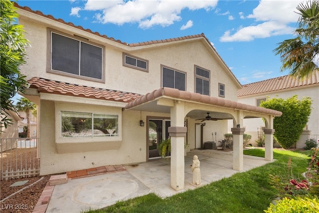 5148 Forest Oaks Dr, Las Vegas, NV 89149 - rear view of property with a tile roof, ceiling fan, stucco siding, a patio, and central AC