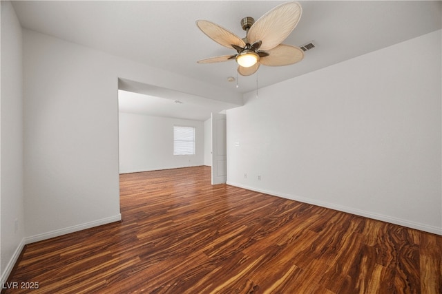 5148 Forest Oaks Dr, Las Vegas, NV 89149 - spare room featuring wood finished floors, ceiling fan, and baseboards