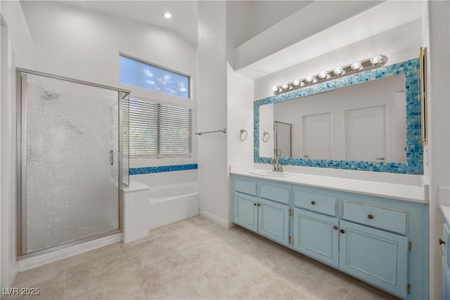 5148 Forest Oaks Dr, Las Vegas, NV 89149 - bathroom with a garden tub, vanity, a stall shower, recessed lighting, and tile patterned flooring