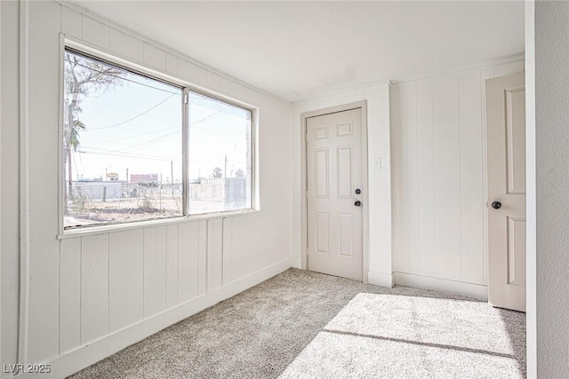 603 W Adams Ave, Las Vegas, NV 89106 - carpeted spare room with healthy amount of natural light and a decorative wall