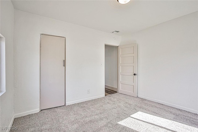 603 W Adams Ave, Las Vegas, NV 89106 - unfurnished bedroom with carpet floors and baseboards