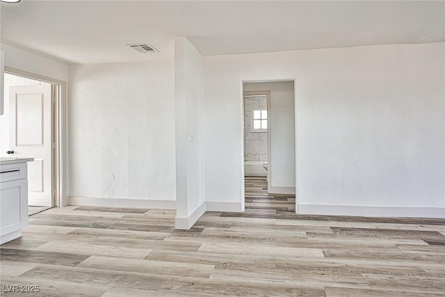 603 W Adams Ave, Las Vegas, NV 89106 - empty room with light wood finished floors and baseboards