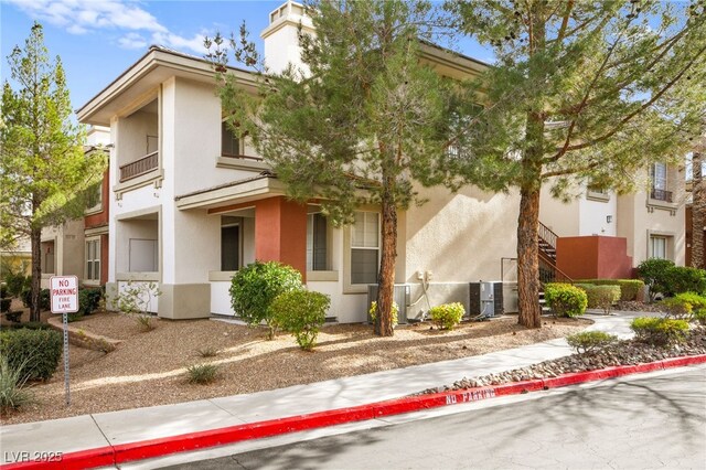913 Duckhorn Ct Unit 204, Las Vegas, NV 89144 - view of building exterior featuring central AC unit