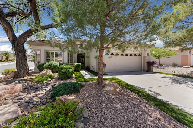 2029 Poppywood Ave, Henderson, NV 89012 - view of front facade with stucco siding, concrete driveway, and an attached garage