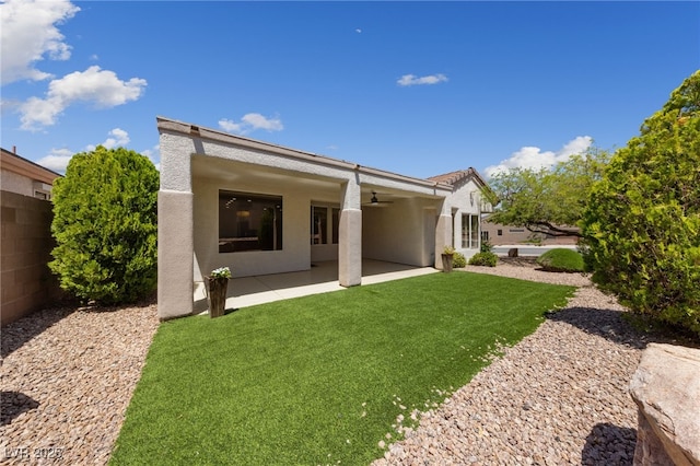 2029 Poppywood Ave, Henderson, NV 89012 - rear view of property with a ceiling fan, a patio, stucco siding, and a yard