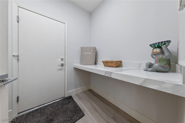 2029 Poppywood Ave, Henderson, NV 89012 - doorway with baseboards and light wood finished floors